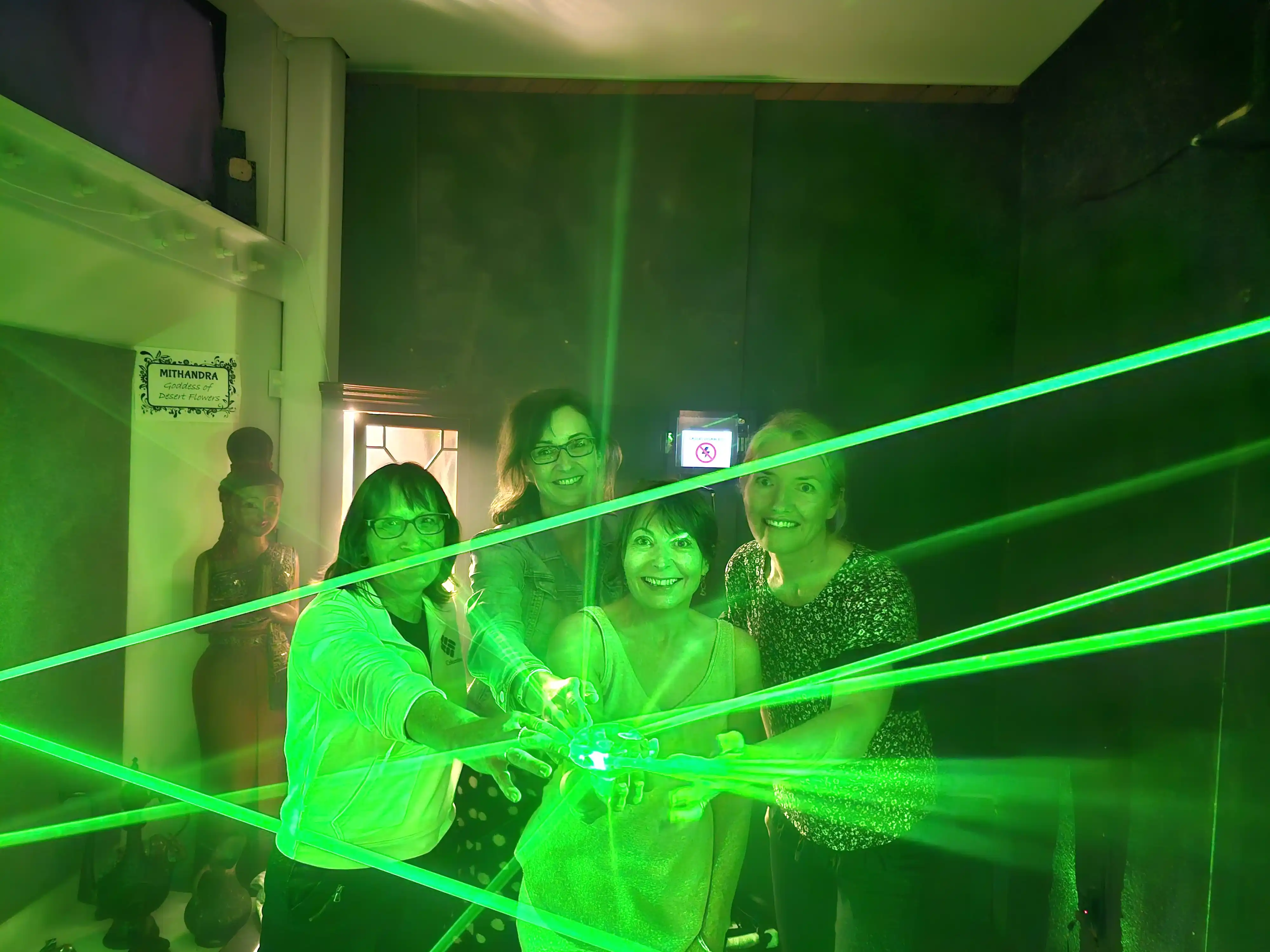 Team navigating laser security in Diamond Heist